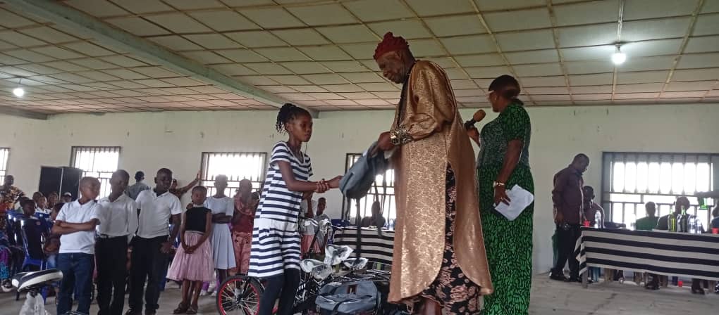 Effiat Offot Presents Books, School Bags, Bicycles to Pupils, Students
